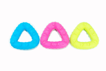 Fototapeta premium Pet supplies about rubber toys for pet on isolated white. Concept rubber toys for dog or cat.