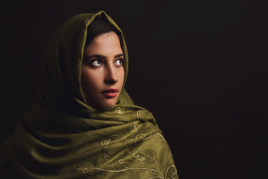 Portrait Of Muslim Women In Green Headscarf