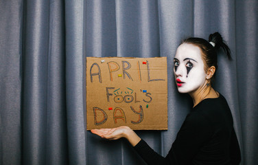 The girl with makeup of the mime. improvisation.