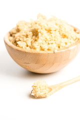 Wooden Bowl full of quinoa.