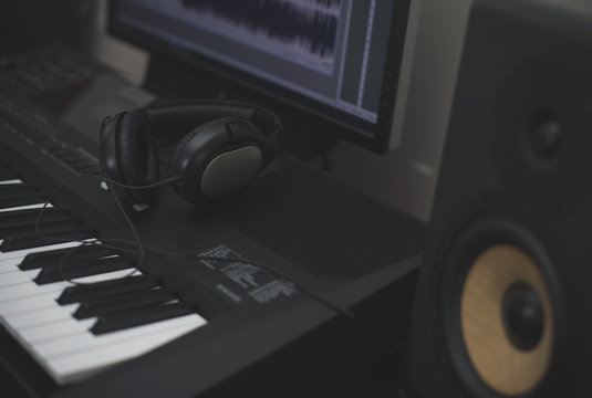 Professional monitors, headphones, midid keyboard and pc with music software.