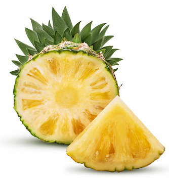 Pineapple fruit cut in half and slice with green leaves