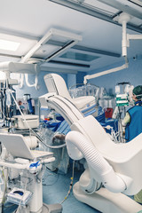 Interventional cardiologist using cardiovascular imaging system with fluoroscopic X-ray tube for...