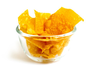 yellow flour sheet fried in small glass bowl, asia snack