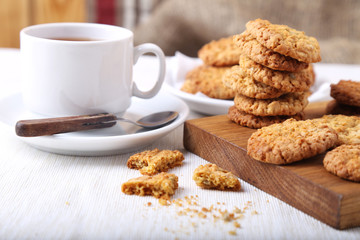 Fresh baked cookies with cup of tea