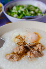 Rice porridge with ground pock and egg