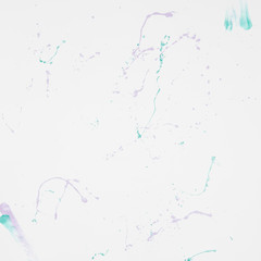 Naklejka premium top view of paper with paint splash