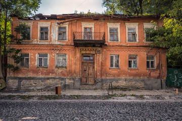 Exterior of old red building located in ancient historic district of Kiev, Ukraine.
