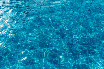 Surface of swimming pool water background