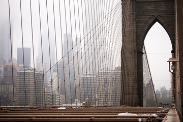 Views of a bridge on a foggy morning