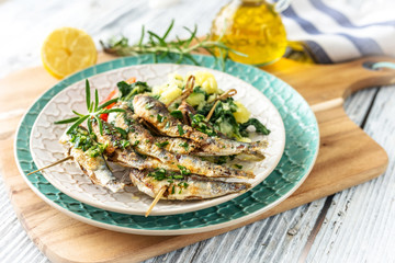 Healthy sardines with potato and chard