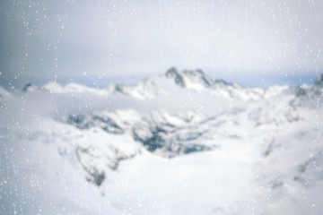 View through the window with rain drop on the Eismeer glacier from the Jungfrau railway in Switzerland.