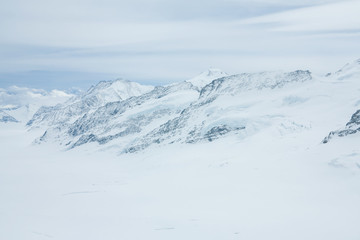 View from the jungfrau mountain summit towards the Aletsch glacier. Bernese Oberland, Switzerland....