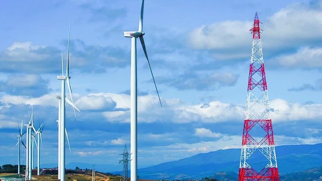Full video HD from energy saving concept with wide angle view from group of wind turbine construction in field and meadow with beauty blue sky and cloudy background