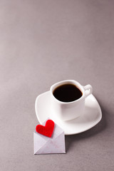 a cup of espresso on a saucer and a love message on Valentine's Day, a declaration of love.