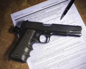 Semi auto handgun and purchase paperwork