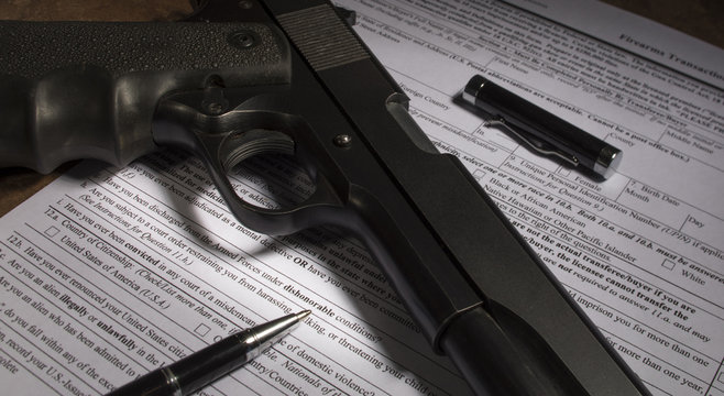 Handgun and background check to make its purchase