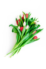 Spring bouquet of tulips on white background top view copy space