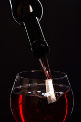 Alcohol and tasting concept. Bottle of wine and glass