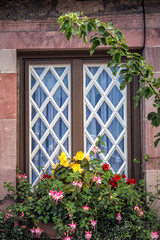 Fototapeta na wymiar Wooden window entrance at old house at Edinburgh, UK.