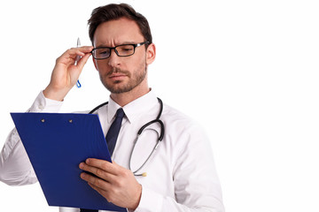 Fototapeta premium smart handsome bearded medical doctor in glasses with Stethoscope isolated on white background. Man from hospital with a Clipboard is ready to write something down