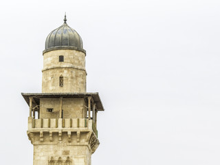 Fototapeta premium Jerusalem, Israel - The tall minaret of the Al-Aqsa Mosque in the Temple Mount in the Old City of Jerusalem, Israel