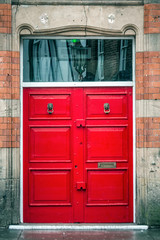 Wooden door entrance at old house at Liverpool, United Kingdom.