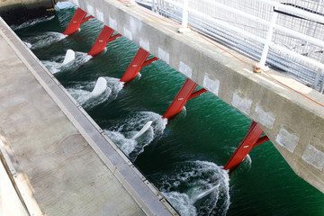 Hydro electric staion in a storm barrier in the Eastrn Scheldt Netherlands - obrazy, fototapety, plakaty