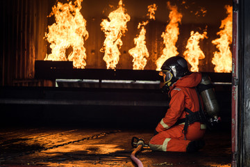 Firefighters training, Team practice to fighting with fire in emergency situation..Spray water to the flame