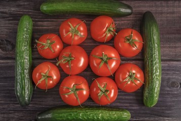 Tomatoes inside of four cucumbers