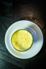 A glass of traditional drink for stamina or energy drink with eggs and tea. Teh talua or teh telor is a tea beverage from West Sumatra. The tea is unique because of the use of egg yolk.