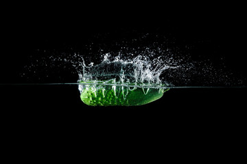 cucumber in water with splash