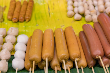 Grilled meatballs and sausages