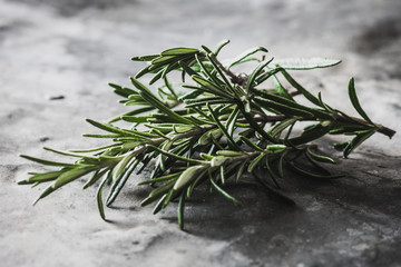 Rosemary on rustic background