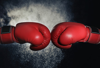 Men in boxing gloves on black background - Powered by Adobe
