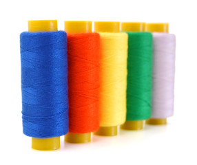 Spools of threads isolated on a white background
