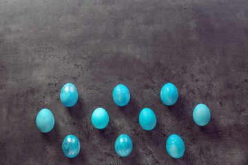 Fototapeta na wymiar Dyed Easter eggs on grey background