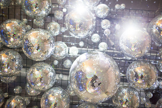 Low angle view of disco balls on ceiling