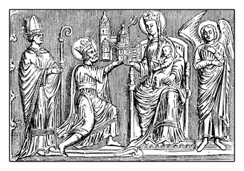 Silver shrine bas-relief with Charlemagne or Charles the Great offering the city cathedral to the Virgin May on a throne, flanked by an angel and a bishop, guarded in Aachen cathedral