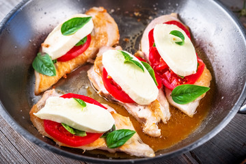 Chicken breast stuffed with mozzarella; basil and tomatoes