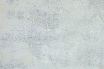 Old gray concrete wall with scuffs and putty, texture background