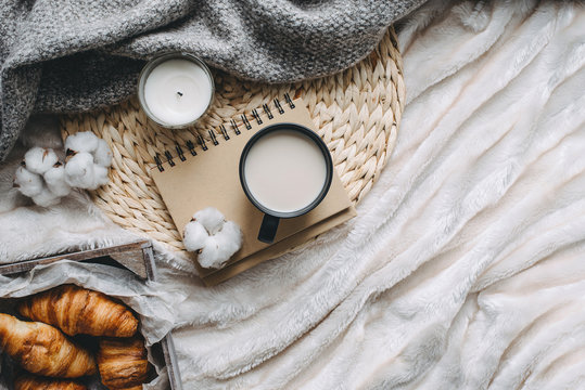 Mug with coffee and home decor on tray
