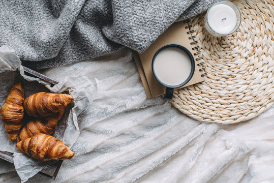 Mug with coffee and home decor on tray