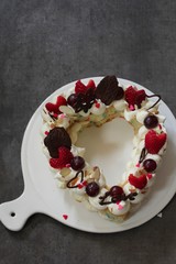 Homemade Trending Heart shaped Cream Tart  Monogram cake , selective focus