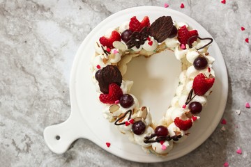 Homemade Trending Heart shaped Cream Tart  Monogram cake , selective focus