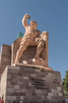 Statue of El Pipila with a clear blue sky, in the background, in Guanajuato, Mexico