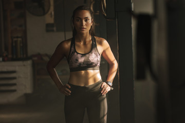 Fototapeta na wymiar Fitness woman in the gym
