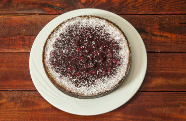 Homemade cherry pie on rustic background