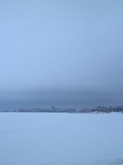 bridge over the river in the winter evening