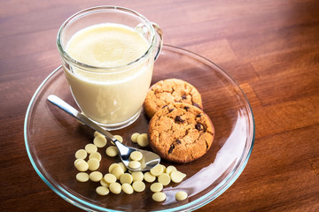Homemade hot chocolate on rustic background